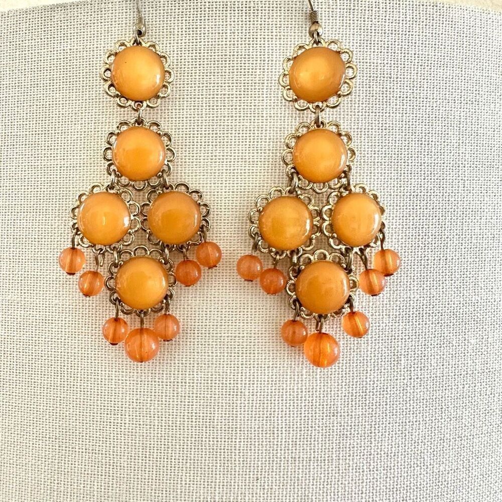 Orange beaded statement earrings